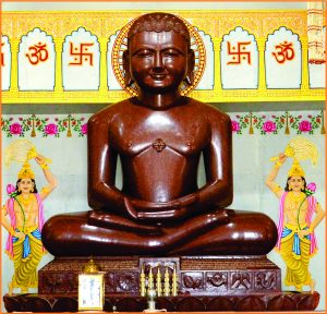 Sacred mahogany idol of Anantnath Bhagwan in meditative pose